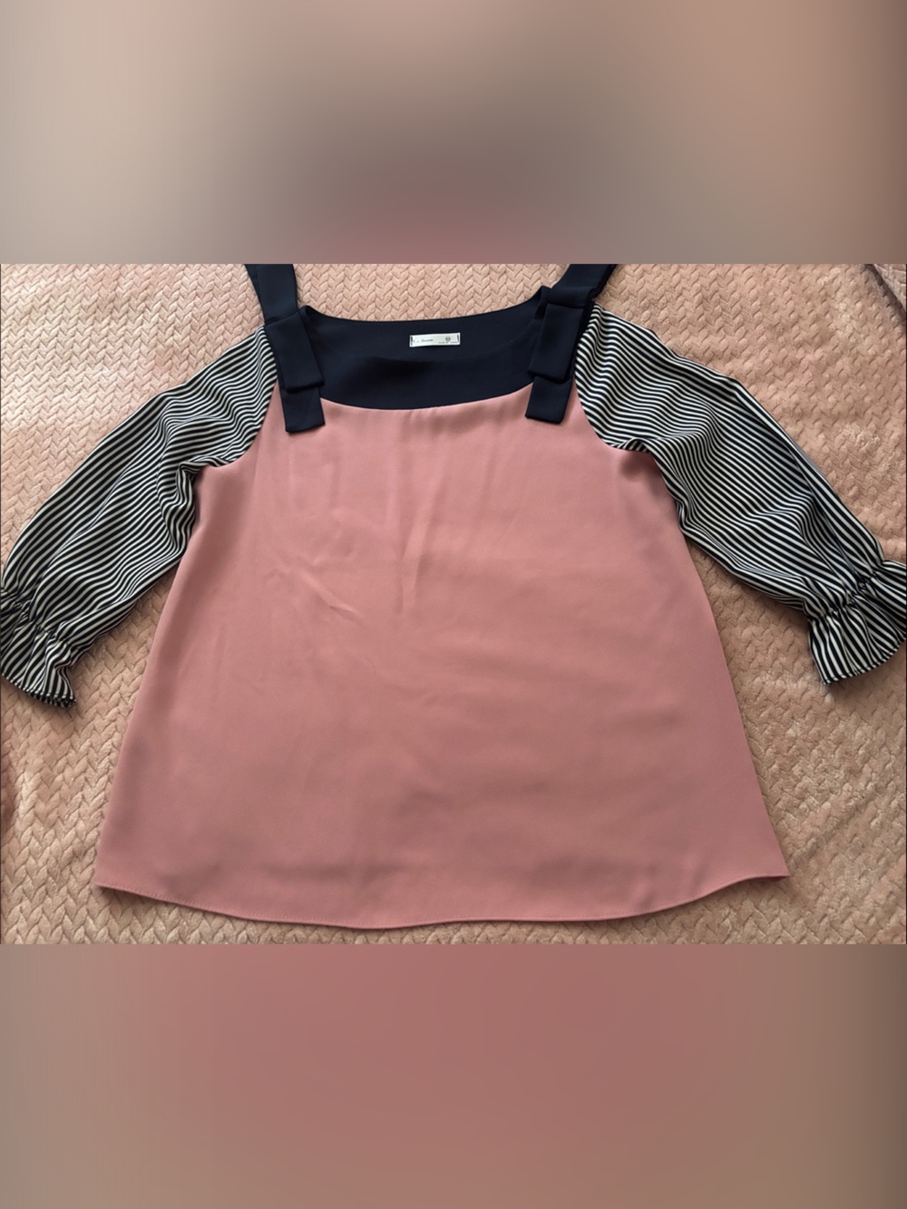 AND Pink Top with Black Accents and Striped Sleeves